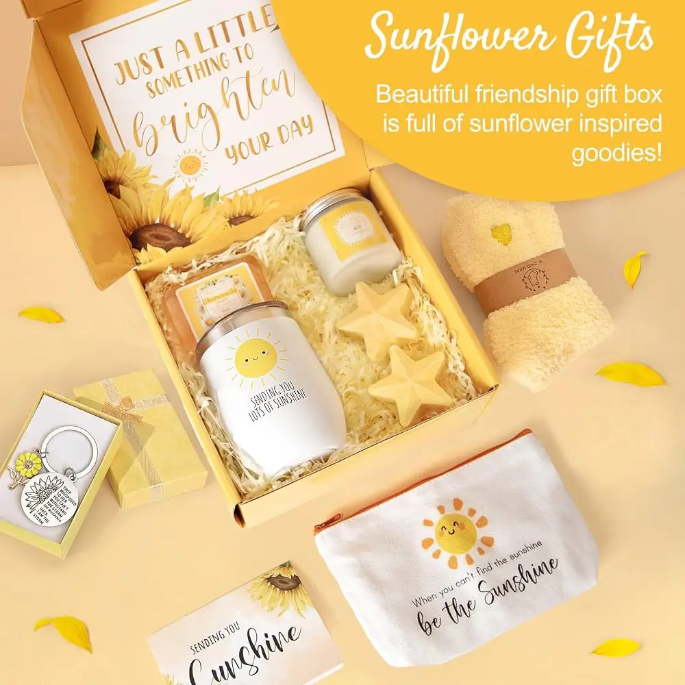 Open yellow Sunflower gift box with a sunshine tumbler, candle, star soaps, socks and a cosmetic pouch